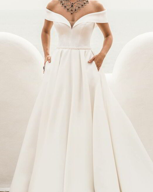 jillian-sposa-2020-bridal-off-shoulder-short-sleeves-sweetheart-neckline-minimally-embellished-clean-elegant-a-line-ball-gown-wedding-dress-pockets-chapel-train-3-mv